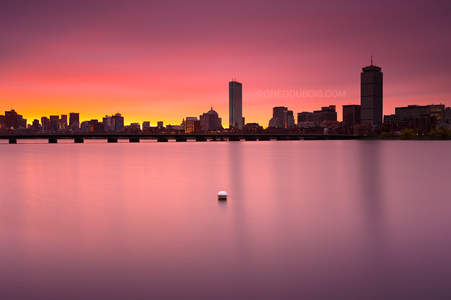 Stormy Pink Sunrise over Boston Skyline, Harvard Bridge, and Charles River with Buoy - Cambridge MA USA
