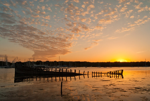 River Hamble Sunset by hutchyp, The sun going down over the ship-wreck on the River Hamble near Warsash in Hampshire.sunset set rive
