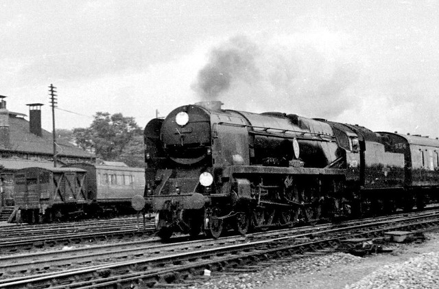 Railways - Battle of Britain 34071 “601 Squadron” heads a down passenger past Basingstoke shed