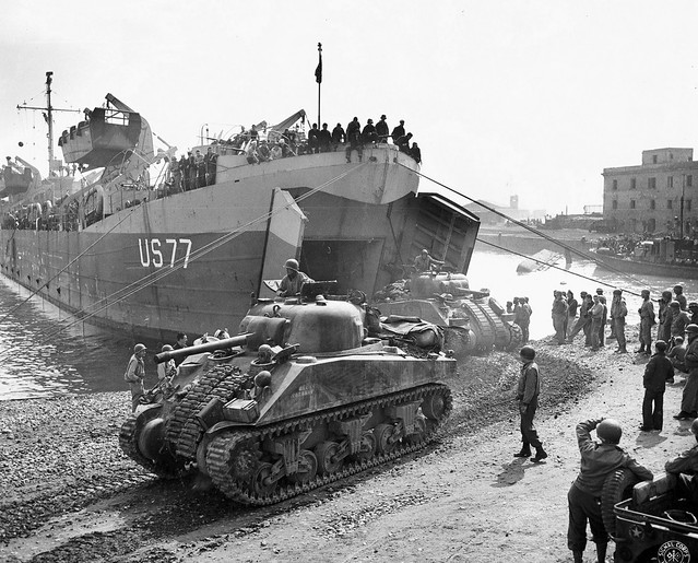 May 1944. Off-loading M4 Sherman tanks at Anzio, Italy.
