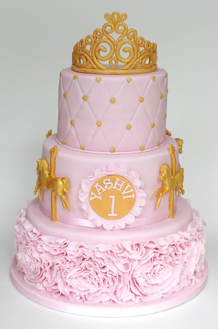 pink and gold first birthday cake