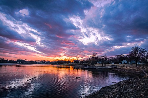 sunset lake ice water beautiful minnesota clouds reflections march colorful crystal ducks shore burst 2015 robbinsdale