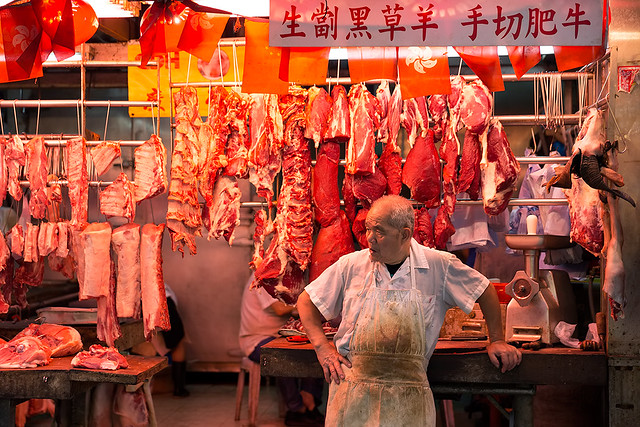 A butcher at Bowrington market in Hong Kong.