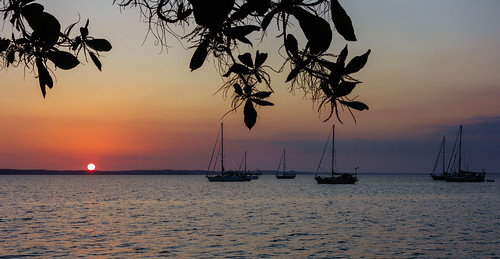 ocean sunset sea sky water silhouette boats harbor haze cu soft cuba sailboats tropics cienfuegos