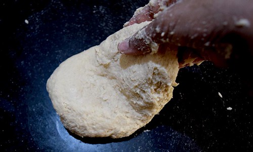 Kneading the dough for Panner Kulcha