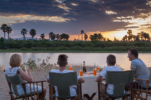 Sunset & champagne, Rufiji River by Paul Molineaux,