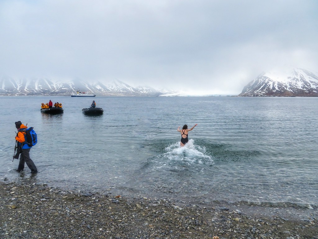 Running into the Arctic ocean in Svalbard, Norway