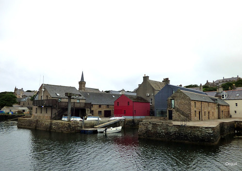 red shed store building grey day stromness waterfront shoreline piers artgallery maritimestudies department old buildings houses kirk spire cloudy overcast sky seaside calm sea july summer evening orkney islands scotland uk greatbritain orcades interesting attractive unusual harbour