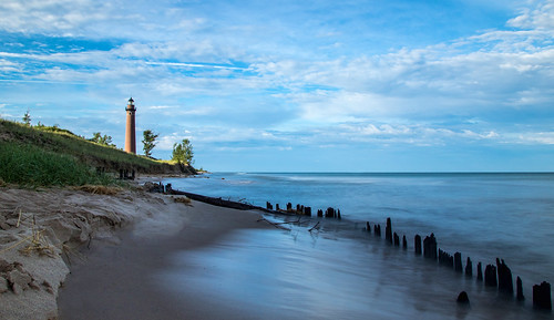 2016 july kevinpovenz westmichigan michigan lakemichigan lighthouse littlesablelighthouse lighhouse oceana oceanacounty sunrise early morning morningsky water beach longexposure canon7dmarkii sand grass lake wood blue clouds