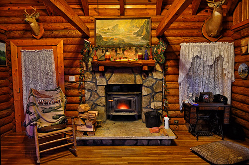 christmas holidays cabin interior logcabin logs stone fireplace warm