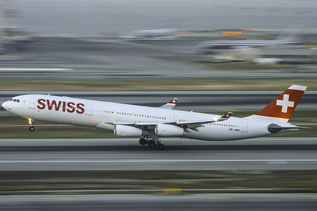 Swiss International A340-300 Departing 28L at SFO after sunset