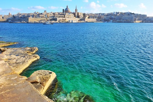 city buildings cityscape malta blue valletta architecture water