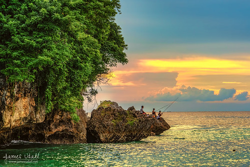 ocean sunset people bali fish beach water clouds indonesia fishing rocks indian cliffs local padangpadang