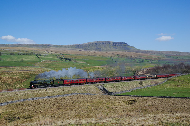 35018 British India Line hauls 'The Great Briton XI ' past Pen-y-ghent on April 20th 2018.