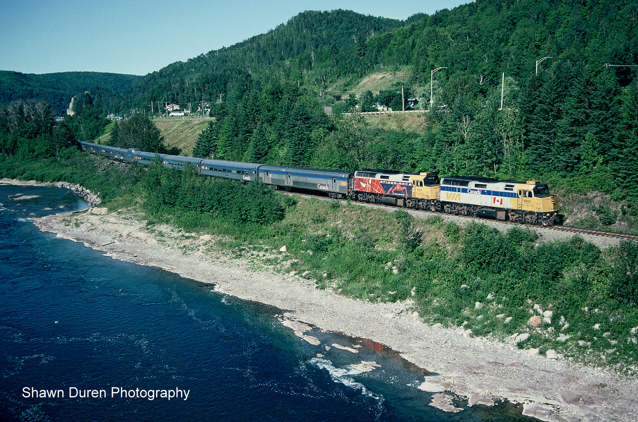 A late running VIA Rail Train #16, the Chaleur departs Matapedia for Gaspe, Quebec. August 15, 2005.