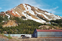 Red Mountain Rising Over Mining Buildings Colorado