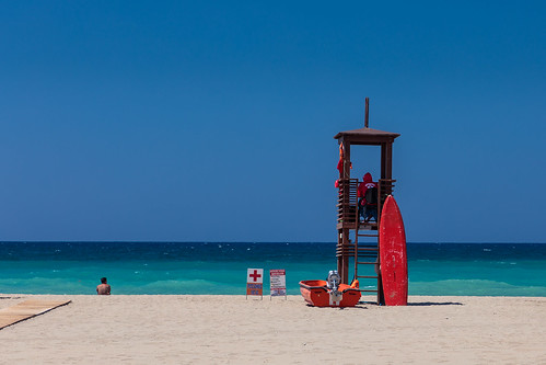 eos beach ef24105mmf4lisiiusm sand sea greece crete canon5dmarkiv vacations summer grecotel lifeguard 5d canon turquoise breeze aegean landscape waves boat rescue red tower swimmer