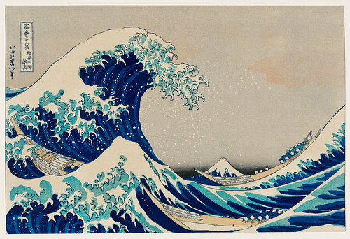 Kanazawa Oki Nami Ura by Katsushika Hokusai (1760-1849) a traditional Japanese Ukyio-e style illustration of extreme waves bearing down on the boats with a view of Mount Fuji. Digitally enhanced from our own original edition.