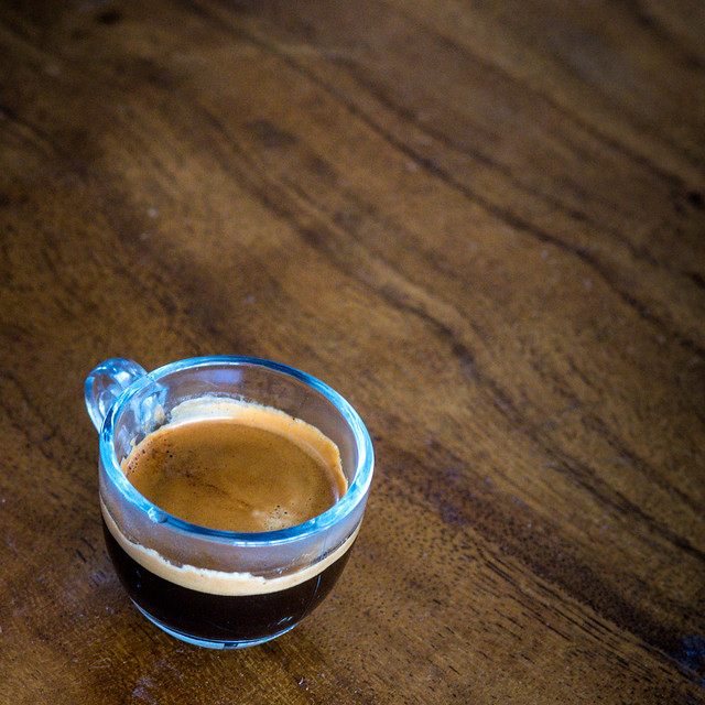 Espresso shot on a wood table