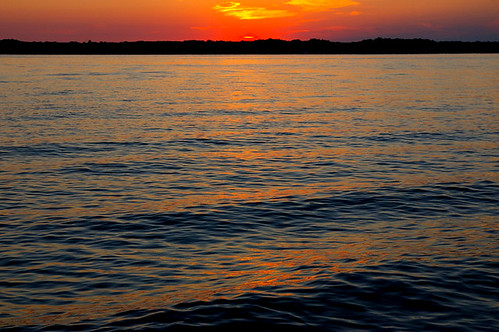 sunset lake reflection water michigan torch