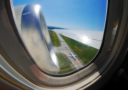 aircraft airplane airliner window seat view boeing 717 b717 engine wing taxiway planes charlotte airport clt 8mm samyang fisheye lens