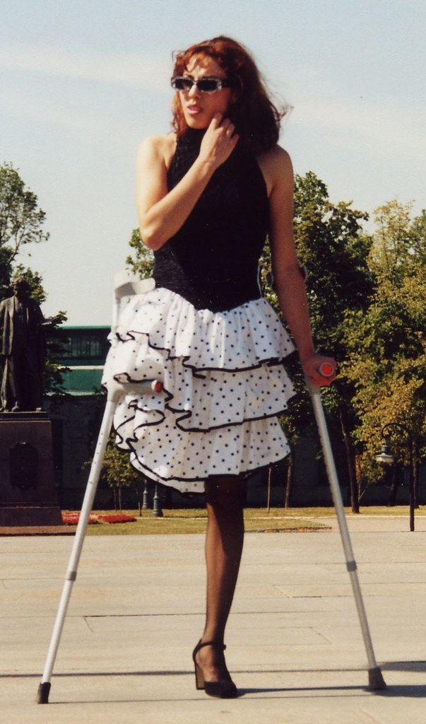 amputee, woman, onelegged, crutches.