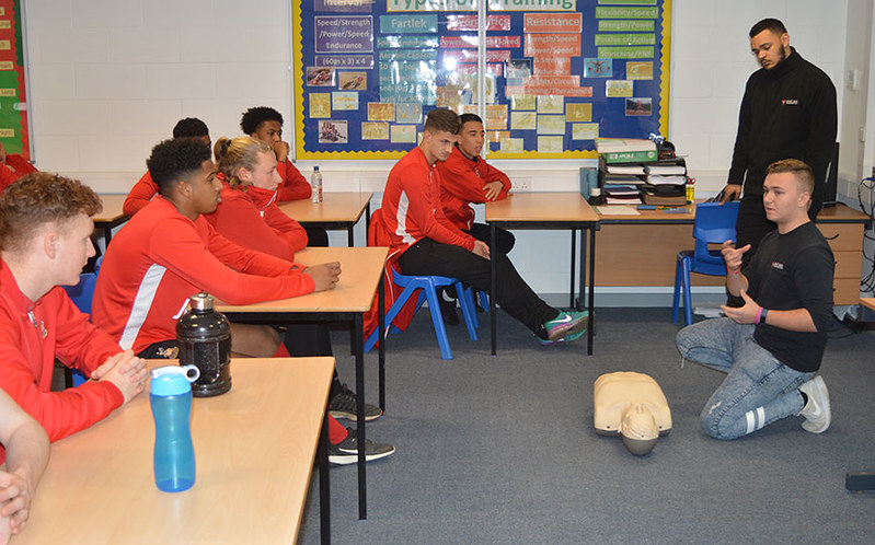 Bradford City youngsters receive a Cardiac Health workshop from Tobi Alabi of Heart4More Foundation