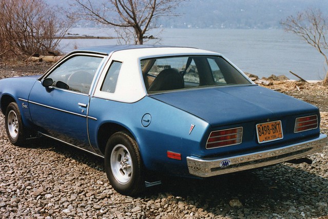 Ah! The good old days. My 1979 Pontiac Sunbird looking sharp with its Landau roof, opera windows, old school 13 inch slotted rims, color matched mud flaps and stick-on logos. That's the Hudson River in the background. Piermont, New York. March 1987