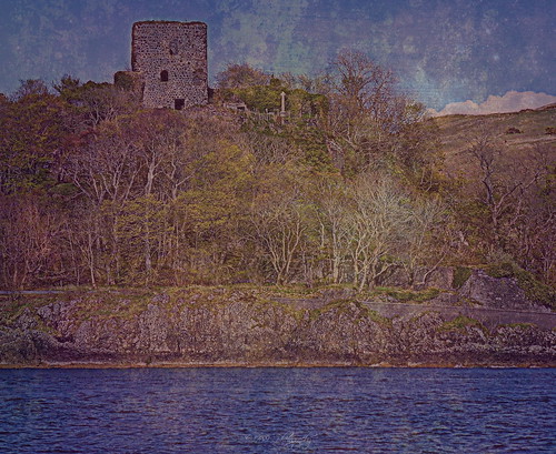 dunolliecastle dunollie oban scotland clan tower rock outcrop fortress castle clanmacdougall medieval sea hill sky trees hillside tree grass building water history historical
