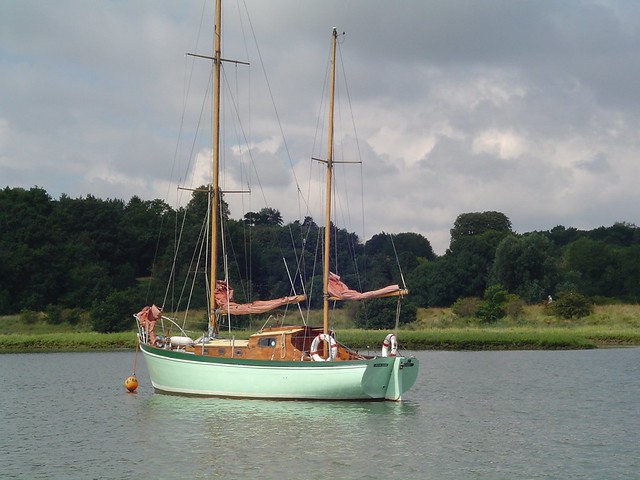 Arthur Ransomes' Peter Duck moored off Kyson Point