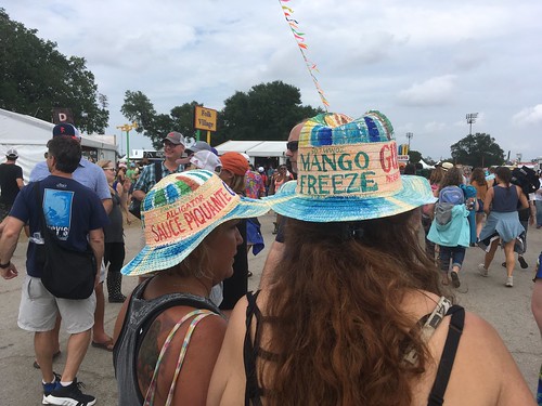 Jazz Fest foodie hats on Day 6 at Jazz Fest - May 5, 2018. Photo by Carrie Booher.