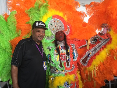 WWOZ Hospitality Tent Action Jackson with Creole Apache Big Chief on Day 4 Jazz Fest - May 3, 2018. Photo by Carrie Booher.