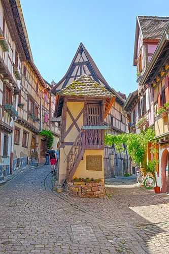 france eguisheim alsace medieval town vines timberframing sky blue remparts historic fujifilm xt2 colours roofs houses streets wood bikes hdr
