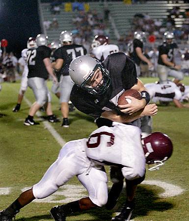 quarterback crunch | Photo by James Branaman Lakeland Ranch … | Flickr