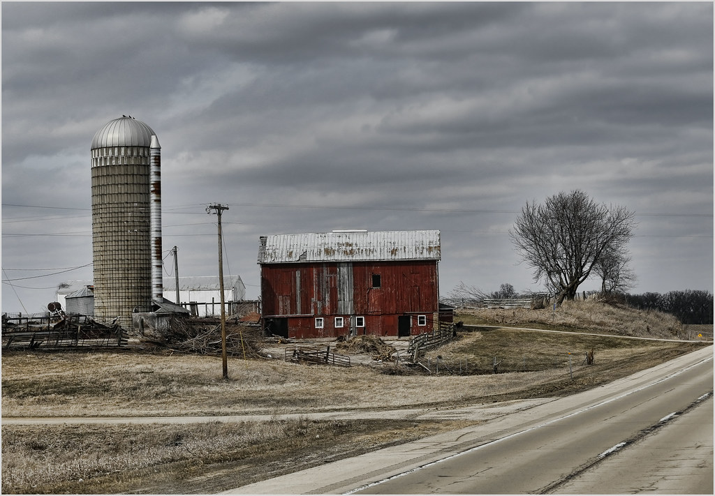 Silo And A Red Barn