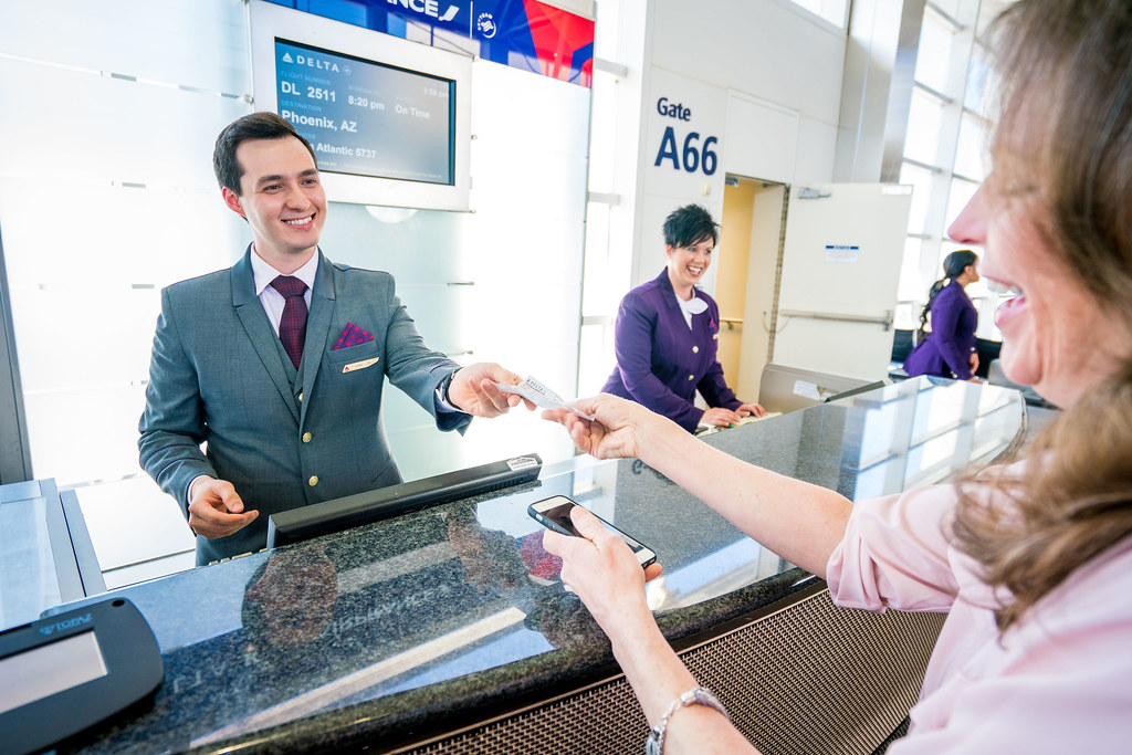 Airport Customer Service gate agent in the lapel suit and … | Flickr